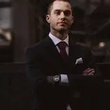 P L